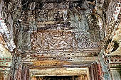 Angkor Wat temple, the crossing cloister, the tympana motifs. 